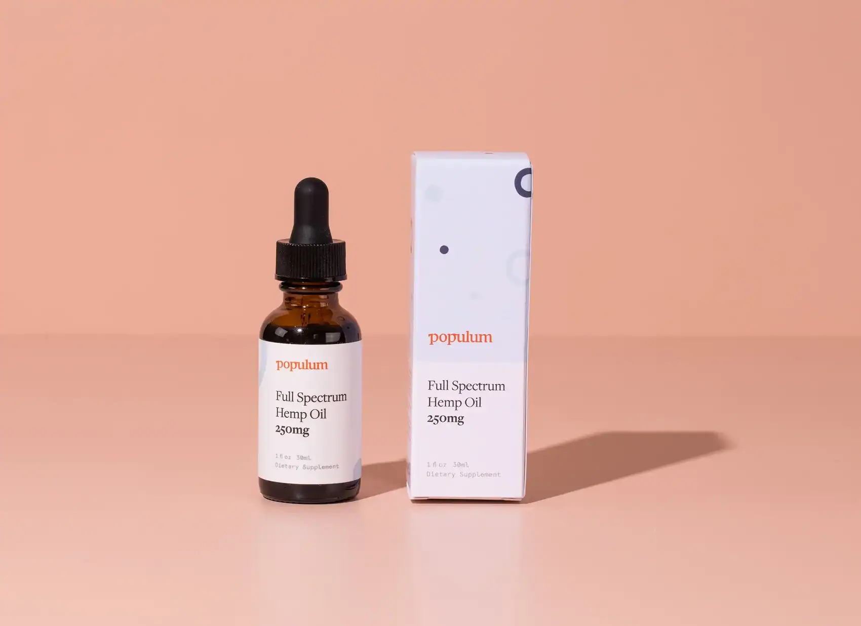 CBD oil bottle and box displayed in a clean editorial product scene.